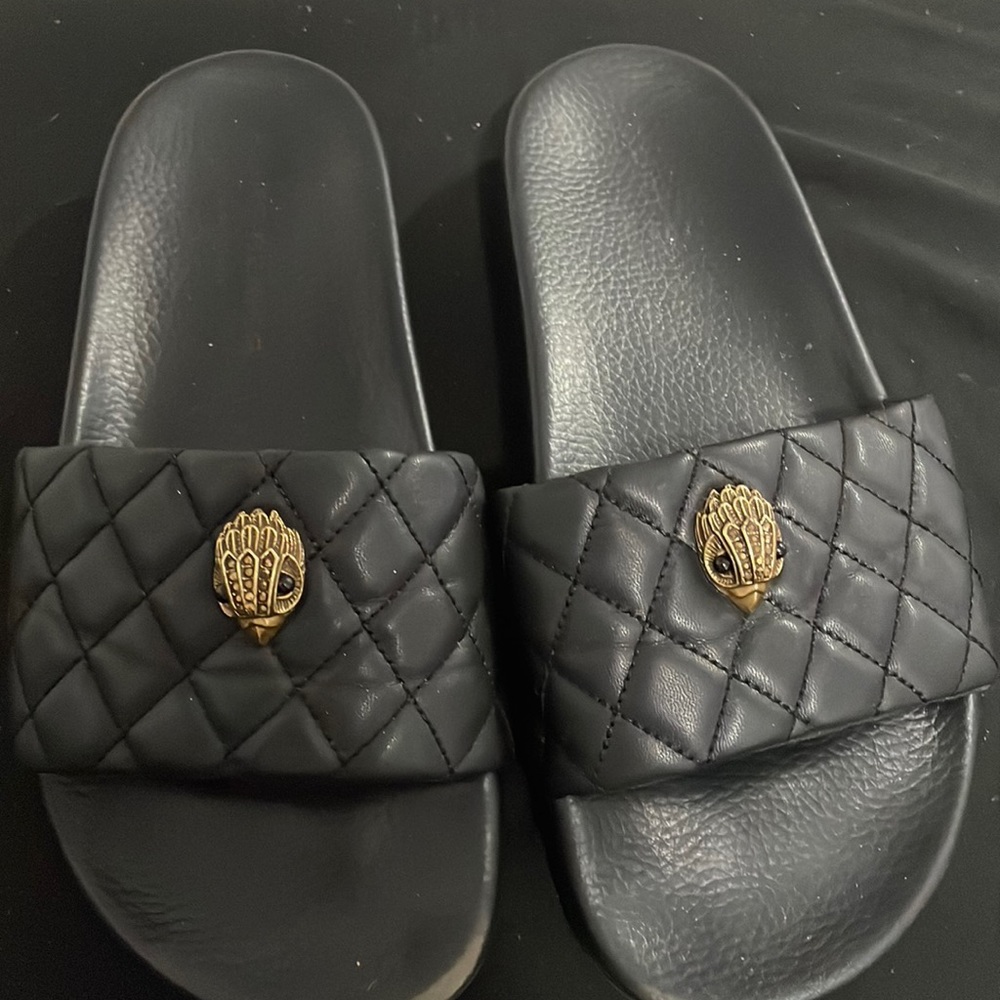 Kurt Geiger black and gold slides